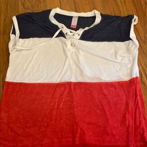 A blue, red, and white striped shirt